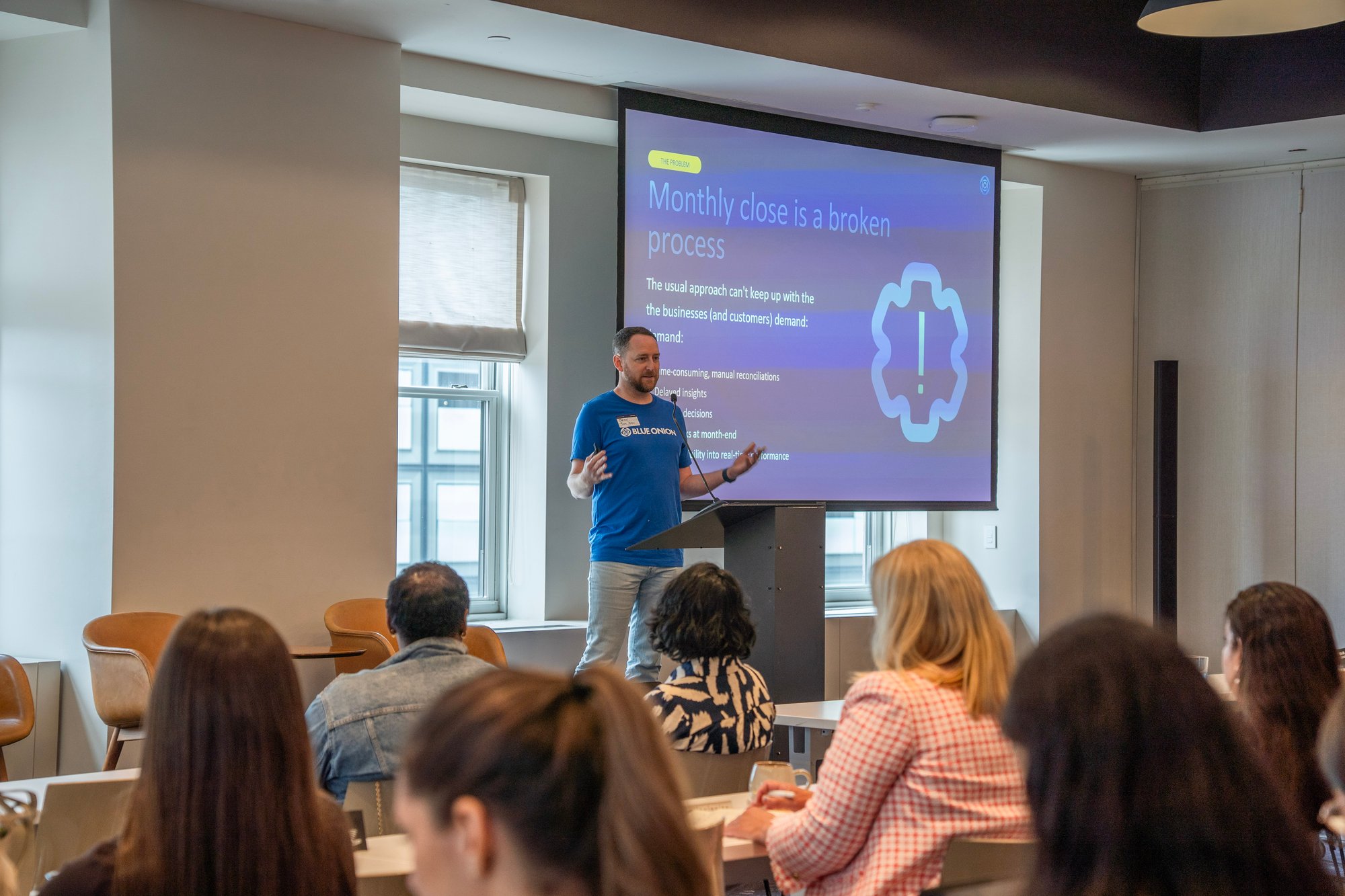 Brian Webb presenting to an audience